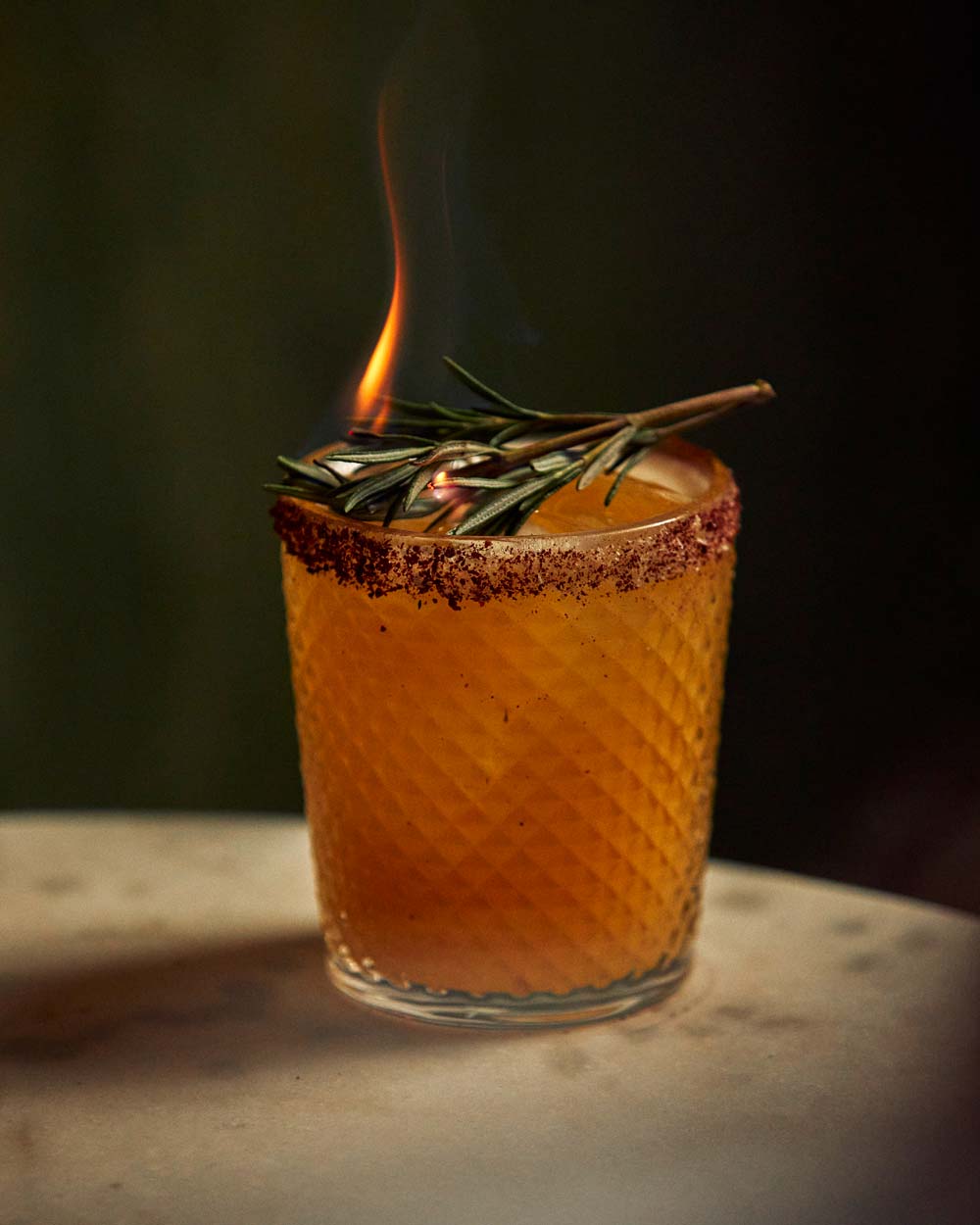 Apotheke Slow Burn cocktail, flaming garnish